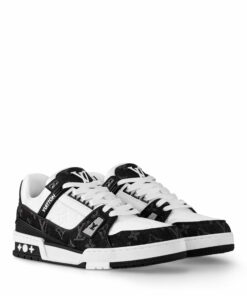 Louis Vuitton LV Trainer Maxi sneaker in black and white monogram denim and leather.